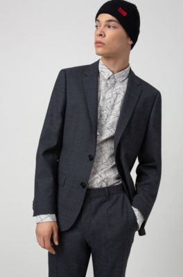 Male model wearing a casual suit by HUGO