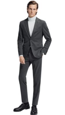 Graues Sakko, wei&szlig;er Strick und schwarze Hose f&uuml;r Herren von BOSS