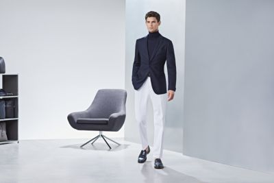 Smart look with white chinos and dark blue blazer by BOSS