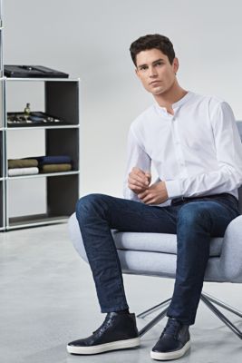 White casual shirt and blue jeans by BOSS