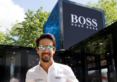 Lucas Di Grassi infron of BOSS sign