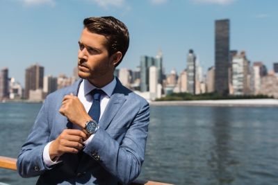 Adam Gallagher wearing the new Grand Prix watch by BOSS