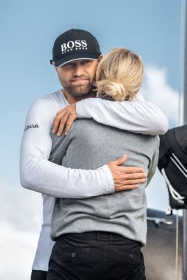 Alex Thomson wearing shirt and hat by BOSS with wife Kate Thomson at the Route du Rhum