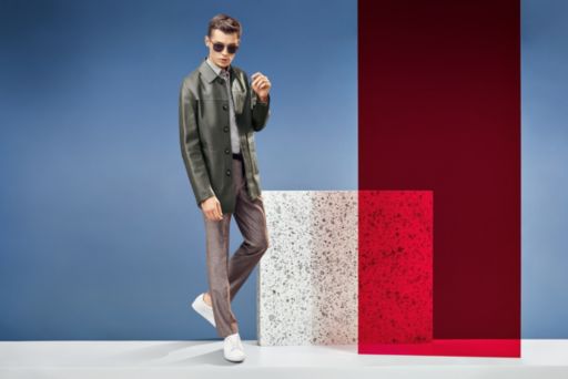 Man in grey suit and white shirt by BOSS