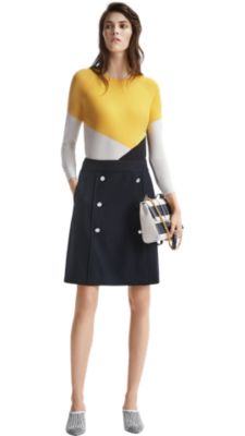 Women wearing multi color knitwear, blue skirt and blue shoes by BOSS