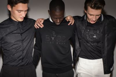 Male models wearing BOSS x Jeremyville collection