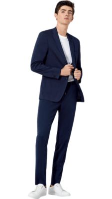  Man wearing green blazer and pants with black shoes by BOSS