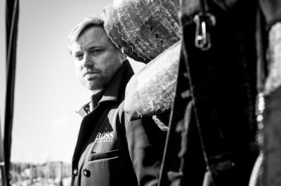 Alex Thomson wearing a black jacket by BOSS