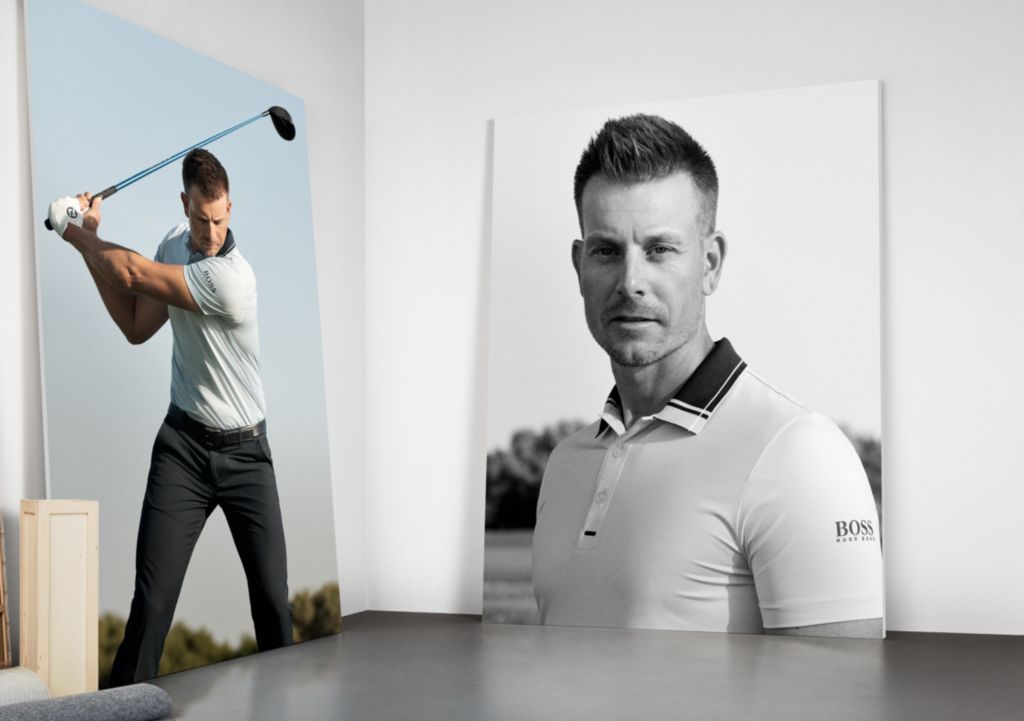 Professional golf player wearing a polo shirt and golf trousers by BOSS