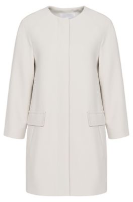 Find elegant coats and trench coats for women from HUGO BOSS