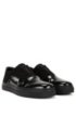 Laceless low-top trainers in mixed leathers, Black