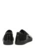 Laceless low-top trainers in mixed leathers, Black