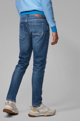 Tapered-fit jeans in mid-blue stretch denim