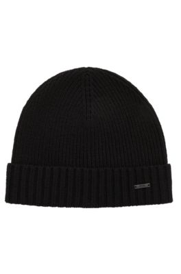 Find hip and trendy hats and caps for men from HUGO BOSS!