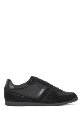 Low-top trainers in leather, suede and 