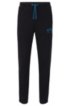 Slim-fit jogging trousers with curved logo, Black