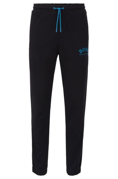 Slim-fit jogging trousers with curved logo, Black