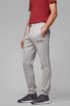 Slim-fit jogging trousers with curved logo, Light Grey