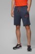 Slim-fit jogging shorts in contrast fabrics with curved logo, Dark Blue