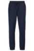 Slim-fit jogging trousers with logo artwork, Dark Blue