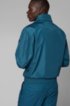 Water-repellent blouson jacket with packable hood, Blue