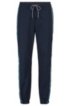 Relaxed-fit jogging bottoms in bi-stretch fabric, Dark Blue