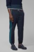 Relaxed-fit jogging bottoms in bi-stretch fabric, Dark Blue
