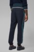 Relaxed-fit jogging bottoms in bi-stretch fabric, Dark Blue