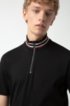 Stand collar polo shirt with graphic Berlin badge, Black