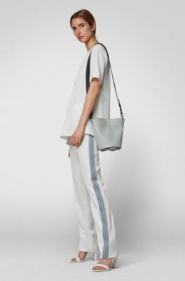 Small bucket bag in calf leather with knotted strap, Open Blue
