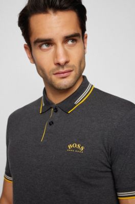 Polo slim fit de piqu&eacute; el&aacute;stico con logo curvado, Gris oscuro