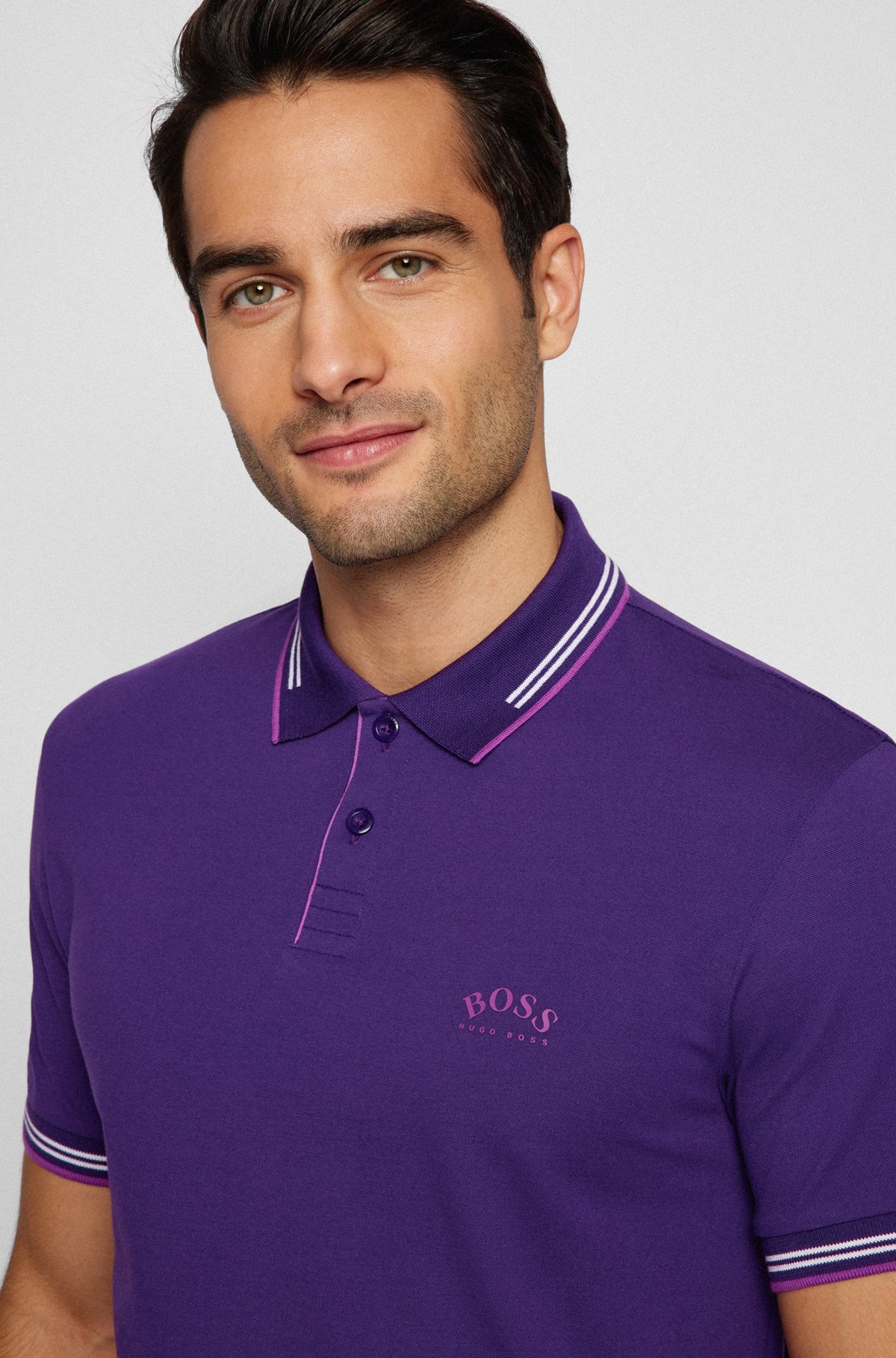 Kustlijn Hong Kong formeel BOSS - Slim-fit polo shirt in stretch piqué with curved logo