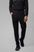 Slim-fit jogging trousers in moisture-wicking stretch fabric, Black