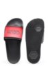 Unisex Italian-made slides with reversed-logo strap, Black