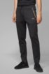 Half-cuffed jogging trousers with curved logo, Black