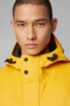 Waterproof rain jacket in laminated stretch fabric, Yellow