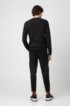 Regular-fit jogging trousers in cotton with zipped hems, Black