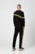 Relaxed-fit jogging trousers with printed side stripes, Black