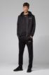 Slim-fit jogging trousers with logo and open hems, Black