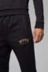 Slim-fit jogging trousers with logo and cuffed hems, Black