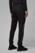 Slim-fit jogging trousers with logo and cuffed hems, Black
