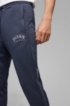 Slim-fit jogging trousers with logo and cuffed hems, Dark Blue