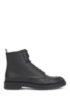 Lace-up boots in Scotch-grain leather with contrast lug sole, Black