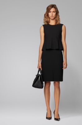 black dress with peplum waist