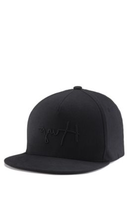 Five-panel cap with reverse-logo embroidery