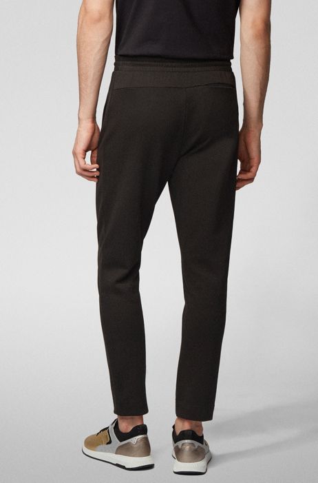 BOSS - Regular-fit jogging trousers with layered metallic logo