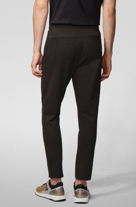BOSS Regular-fit jogging trousers with layered metallic logo