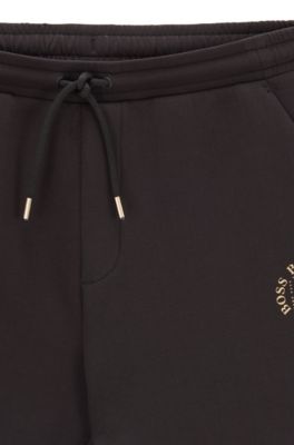 black and gold hugo boss tracksuit bottoms