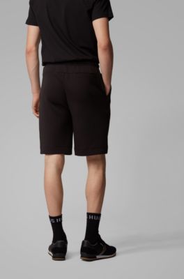 BOSS - Relaxed-fit shorts with layered 