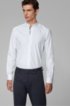 Slim-fit shirt with stand collar and dynamic cutlines, White